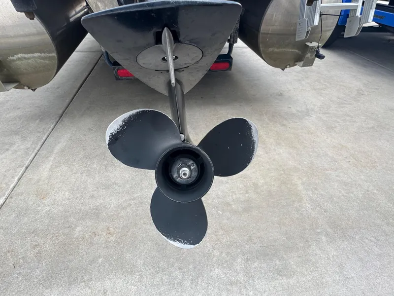 Slide: The Image of Propeller of a 2017 Sylvan Mirage 818 Cruiser on concrete surface. - 10