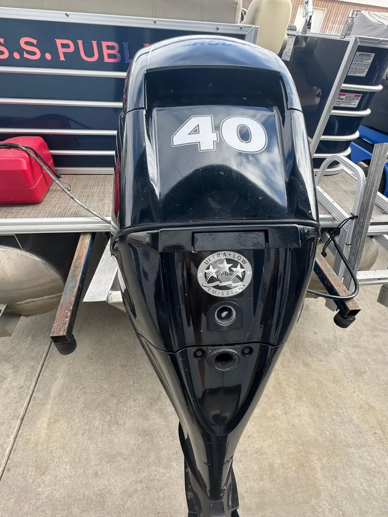 Slide: The Image of Outboard motor on 2017 Sylvan Mirage 818 Cruiser, featuring "40" and "Ultra Low Emission" labels. - 11