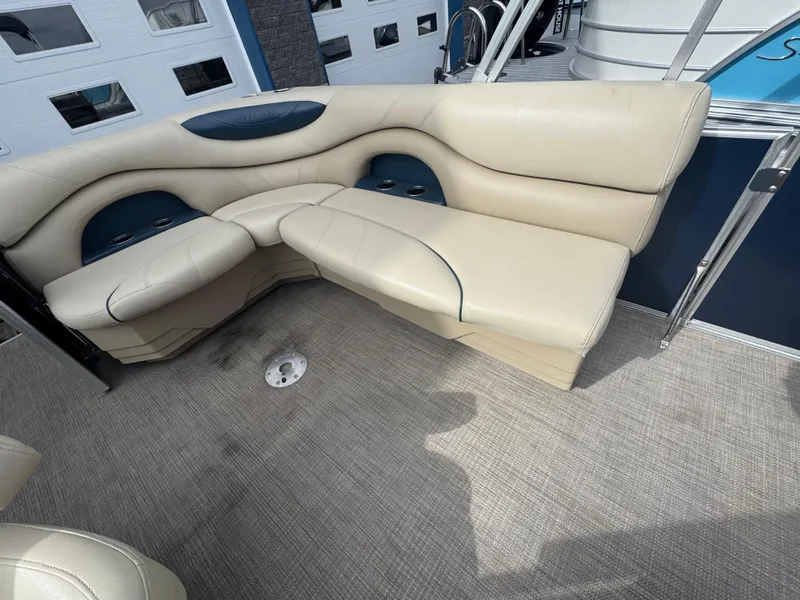 Slide: The Image of Beige seating area on a 2017 Sylvan Mirage 818 Cruiser boat. - 5