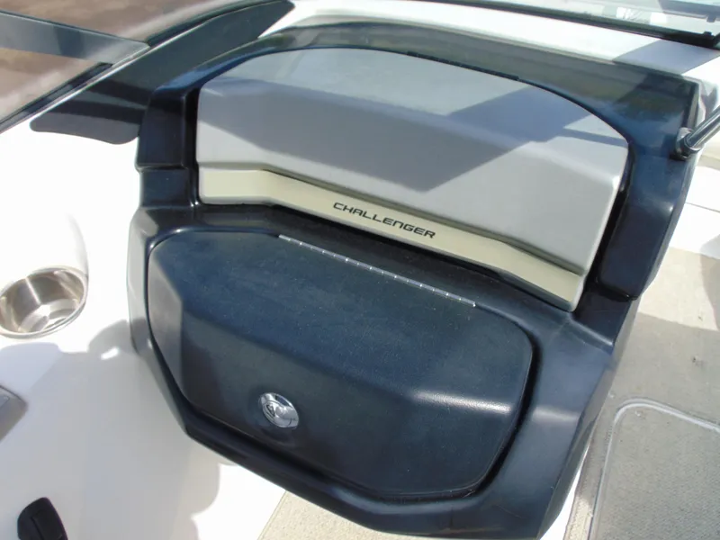 Slide: The Image of 2011 Sea-Doo 180 Challenger SE dashboard with "Challenger" label, featuring sleek design. - 12