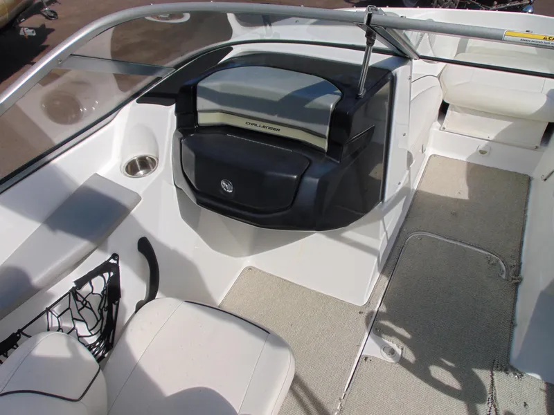 Slide: The Image of 2011 Sea-Doo 180 Challenger SE interior with seating and dashboard view. - 6