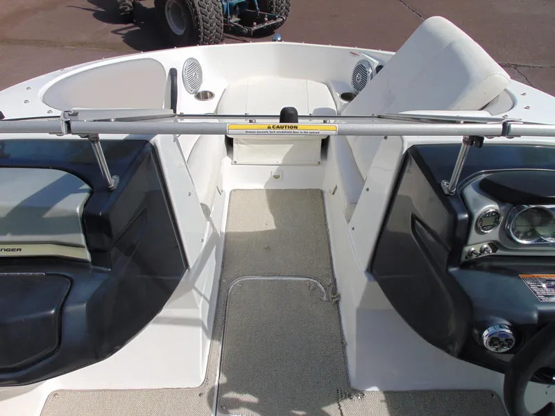 Slide: The Image of 2011 Sea-Doo 180 Challenger SE interior with seating and dashboard view. - 8
