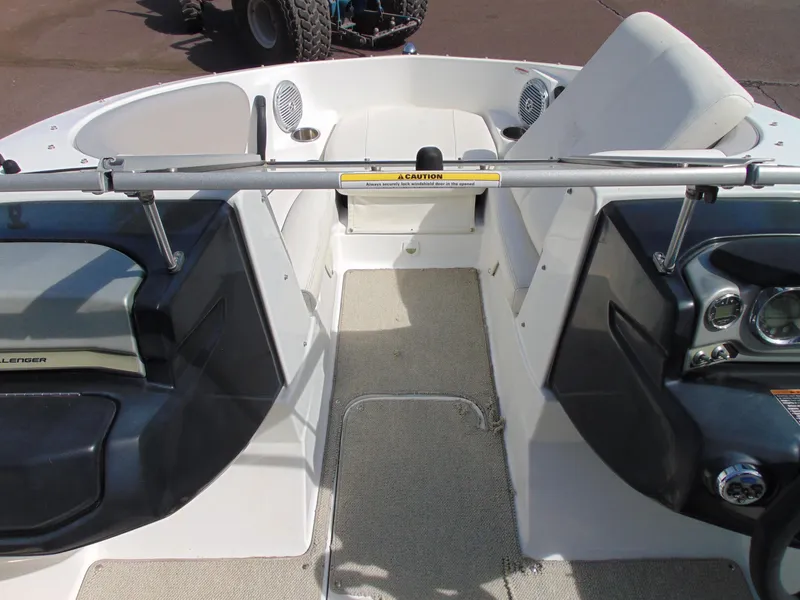 Slide: The Image of 2011 Sea-Doo 180 Challenger SE interior with seating and control panel. - 9