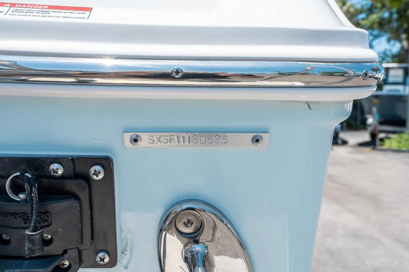 Slide: The Image of 2025 Sea Hunt Gamefish 25 boat hull identification number plate. - 33