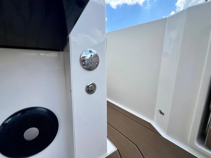 Slide: The Image of 2025 Navan C30 boat deck with speaker and water control panel. - 13