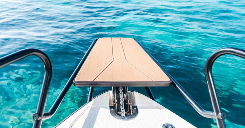 Slide: The Image of Navan C30 boat deck overlooking clear blue water, 2025 model. - 17