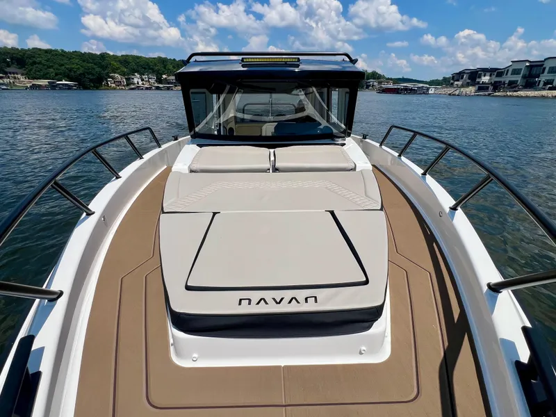 Slide: The Image of 2025 Navan C30 boat on water, featuring spacious deck and modern design. - 19
