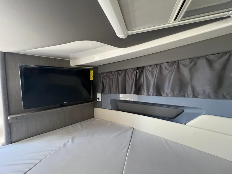 Slide: The Image of Interior of 2025 Navan C30 RV with TV and modern design. - 38