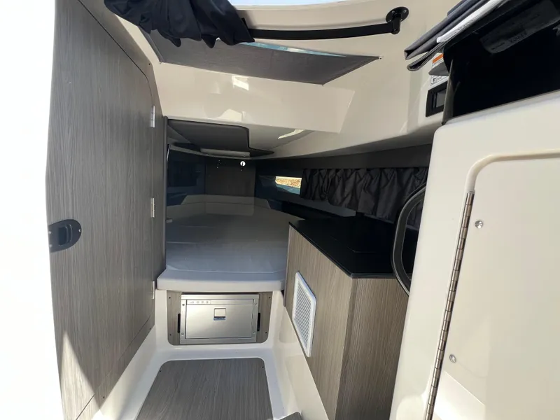 Slide: The Image of Interior of 2025 Navan C30 boat cabin with modern design and compact amenities. - 42