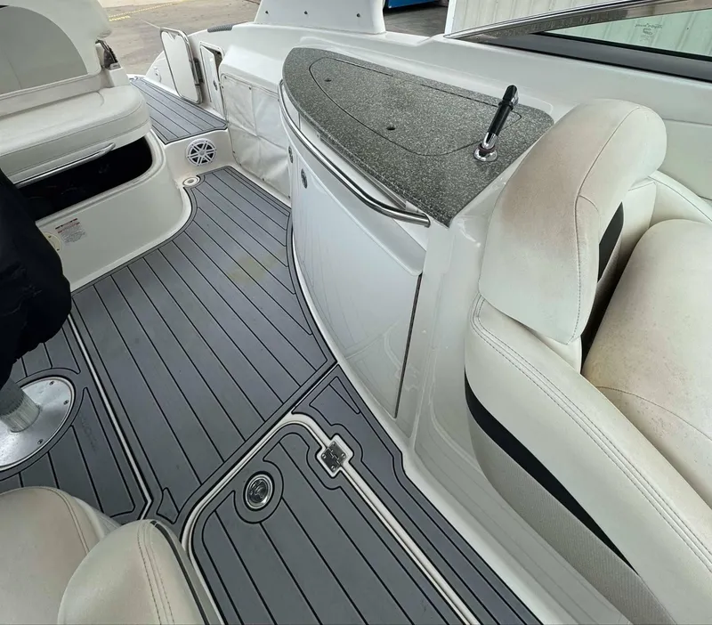 Slide: The Image of Interior of 2007 Chaparral SSX 276 boat with sleek seating and modern flooring. - 21