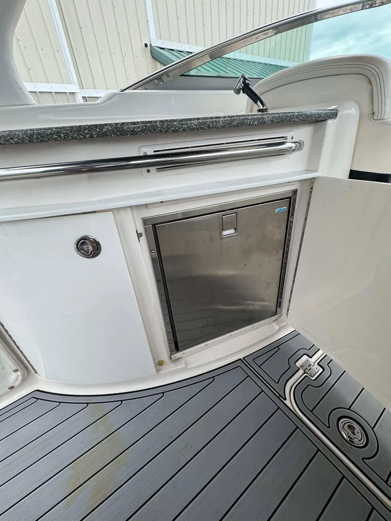 Slide: The Image of 2007 Chaparral SSX 276 boat interior with stainless steel storage compartment. - 28