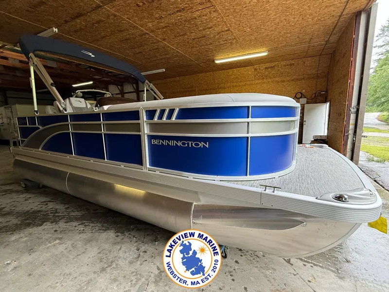 Slide: The Image of 2024 Bennington 20 SXSNP pontoon boat in a garage at Lakeview Marine. - 0