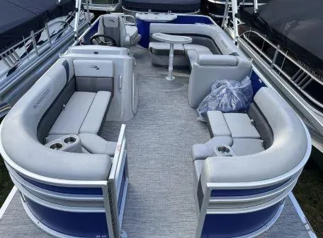 Slide: The Image of 2024 Bennington 20 SXSNP pontoon boat with spacious seating and modern design. - 14