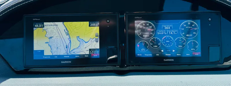 Slide: The Image of Dashboard of a 2018 Cobalt 23SC with Garmin navigation and instrument displays. - 24