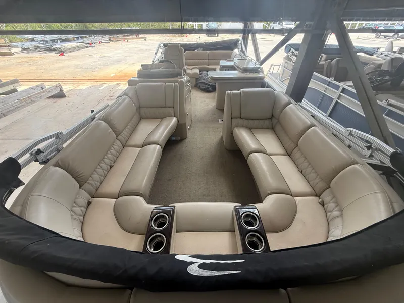 Slide: The Image of 2014 Bennington 2550 RCB pontoon boat with spacious seating and cup holders. - 28