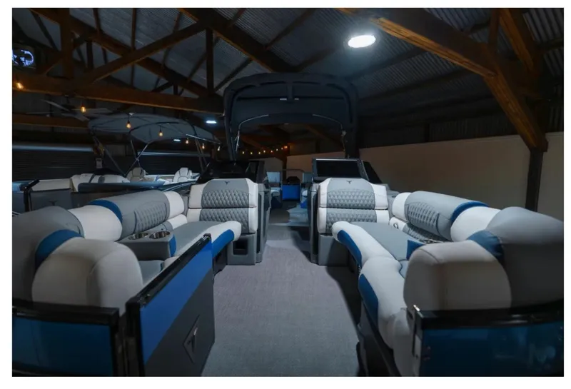 Slide: The Image of 2025 Tahoe Grand Tahoe LTD boat interior with luxurious seating and modern design. - 3