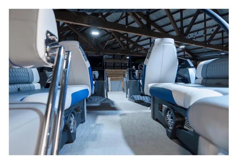 Slide: The Image of Interior of 2025 Tahoe Grand Tahoe LTD boat with luxurious seating and modern design. - 4