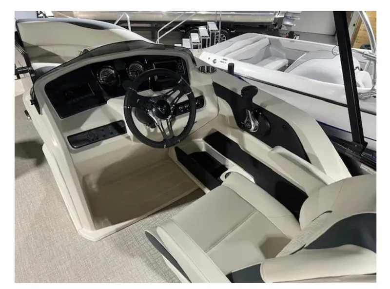 Slide: The Image of 2025 Tahoe LTZ boat interior with steering wheel and control panel. - 2