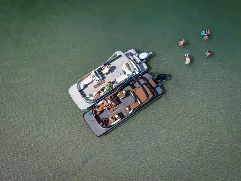 Slide: The Image of Aerial view of two boats and swimmers in clear water, 2025 Tahoe LTZ. - 22