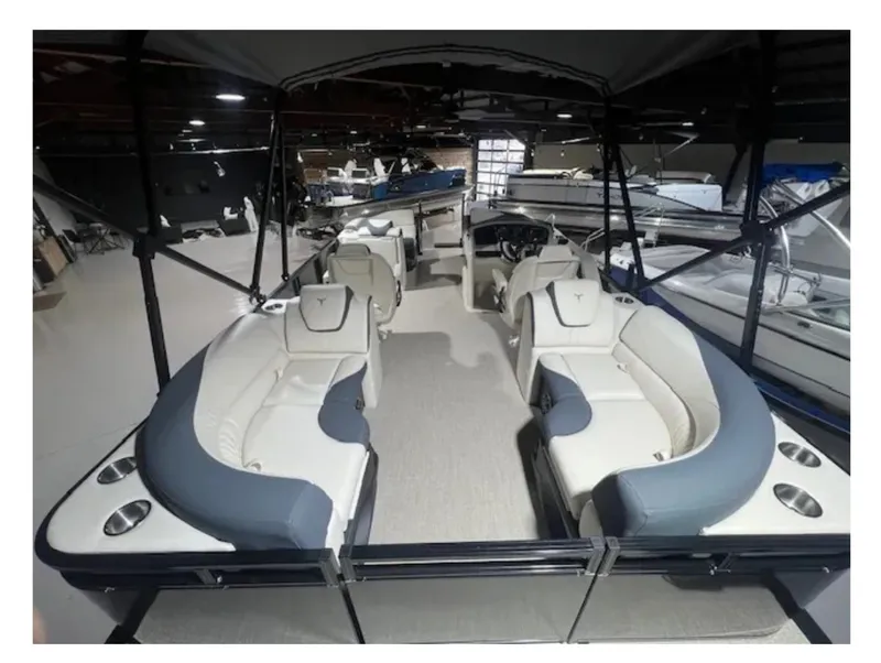 Slide: The Image of 2025 Tahoe LTZ pontoon boat interior with plush seating and modern design. - 3