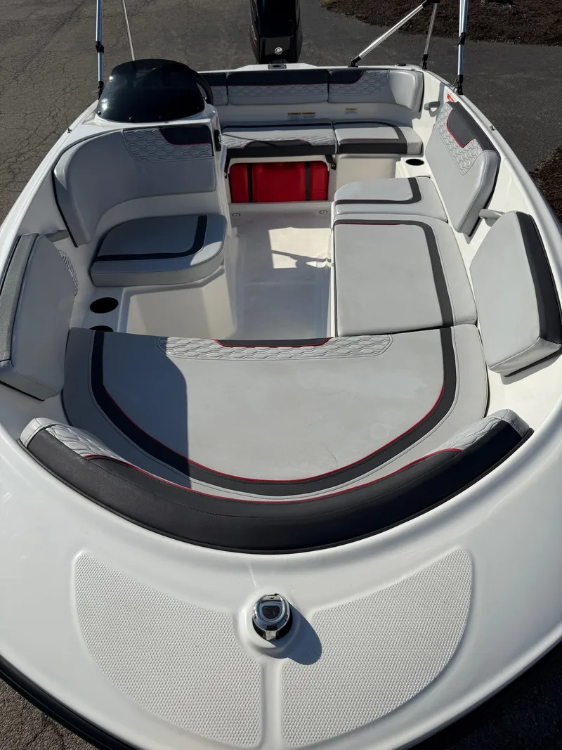 Slide: The Image of 2022 Bayliner Element M15 boat interior with spacious seating and modern design. - 3