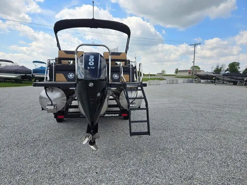 Slide: The Image of 2025 Avalon Catalina Quad Lounge Shift boat with 300 V8 engine, rear view. - 4