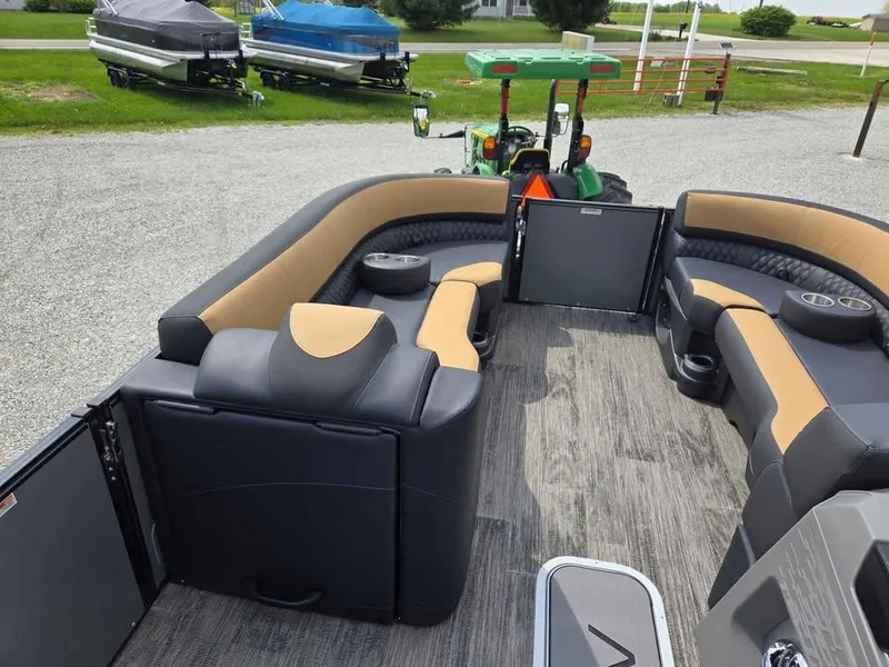 Slide: The Image of Avalon 2025 Catalina Quad Lounge Shift pontoon boat interior with plush seating and modern design. - 5