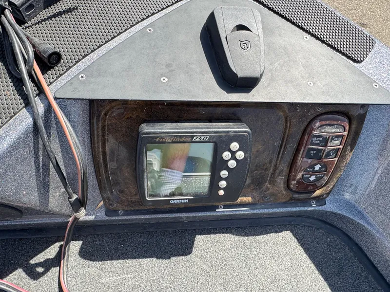 Slide: The Image of 2004 Ranger 619 VS Fisherman boat dashboard with Garmin fishfinder and control panel. - 14