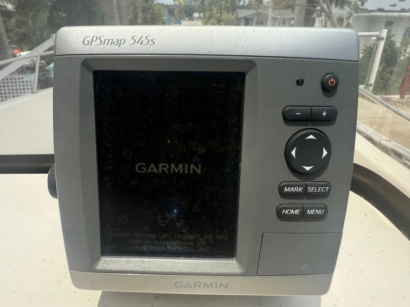 Slide: The Image of Garmin GPSmap 545s on 2008 Cobia 194 Center Console boat dashboard. - 19