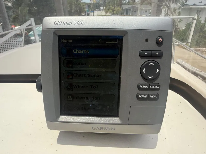 Slide: The Image of Garmin GPSmap 545s on 2008 Cobia 194 Center Console boat, displaying navigation options. - 20