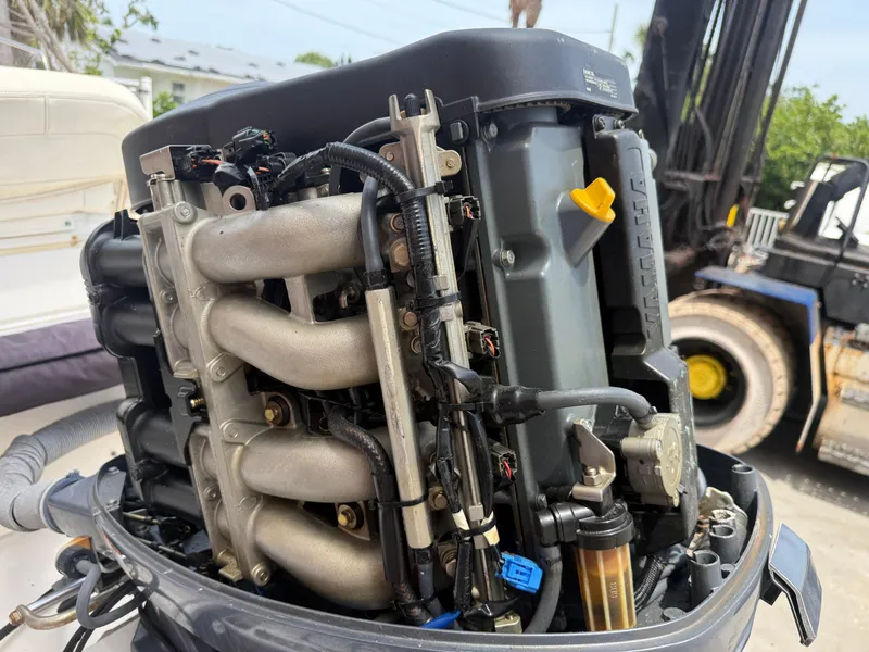 Slide: The Image of 2008 Cobia 194 Center Console boat engine, detailed view of components and wiring. - 28