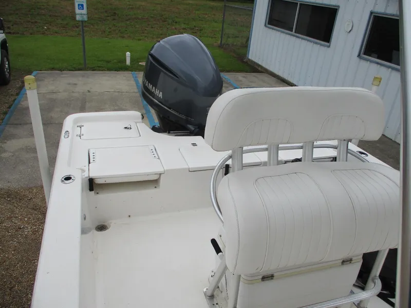 Slide: The Image of 2013 Sea Fox 240 Viper boat with Yamaha outboard motor and white seating. - 11