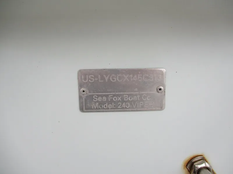 Slide: The Image of 2013 Sea Fox 240 Viper identification plate on boat hull. - 15