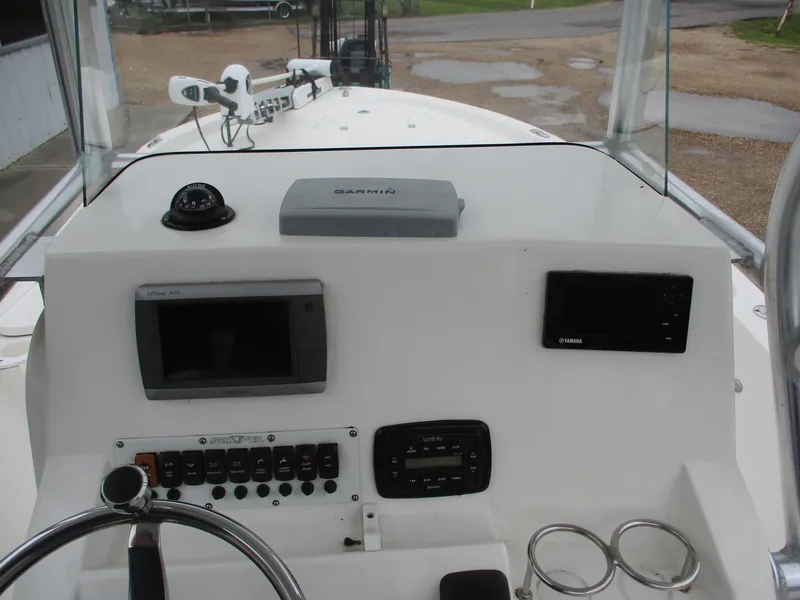 Slide: The Image of 2013 Sea Fox 240 Viper boat dashboard with Garmin navigation system and controls. - 7