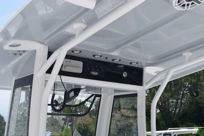 Slide: The Image of 2025 Sea Hunt Ultra 275 SE boat console with modern controls and sleek design. - 10
