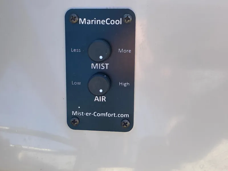 Slide: The Image of Control panel for MarineCool mist and air settings on JC Sporttoon 26TT, 2023 model. - 14