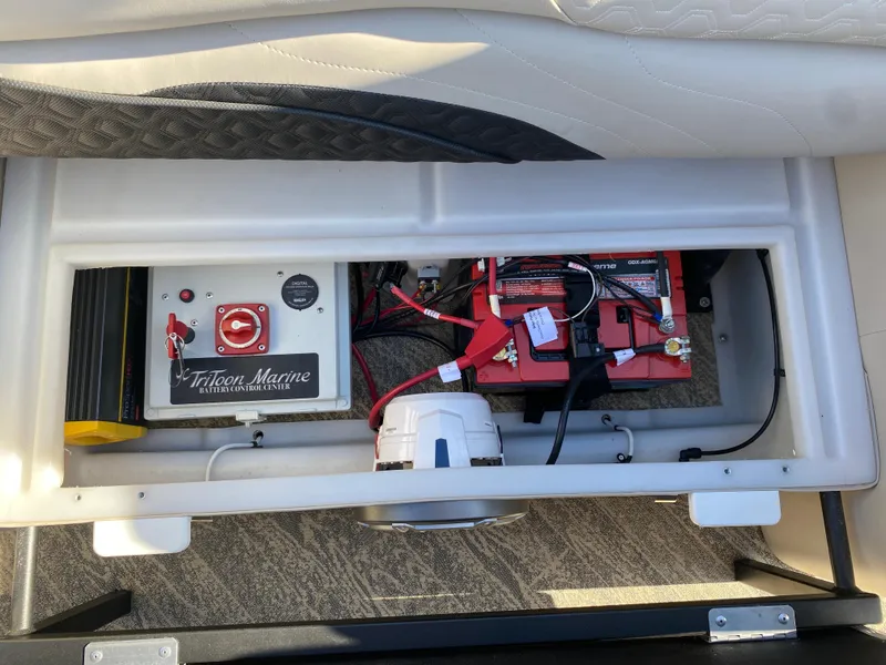 Slide: The Image of Battery compartment of 2023 JC Sporttoon 26TT boat with Triton Marine components. - 32