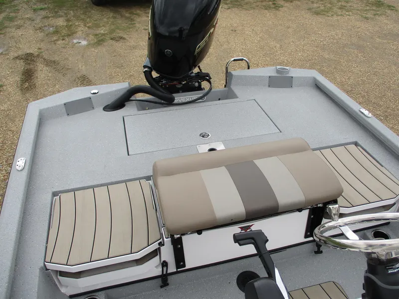 Slide: The Image of 2025 Vexus ACX2000 boat interior with seating and motor, featuring a sleek design. - 11