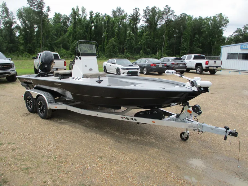 Slide: The Image of 2025 Vexus ACX2000 boat on trailer in parking lot, surrounded by cars and trees. - 2