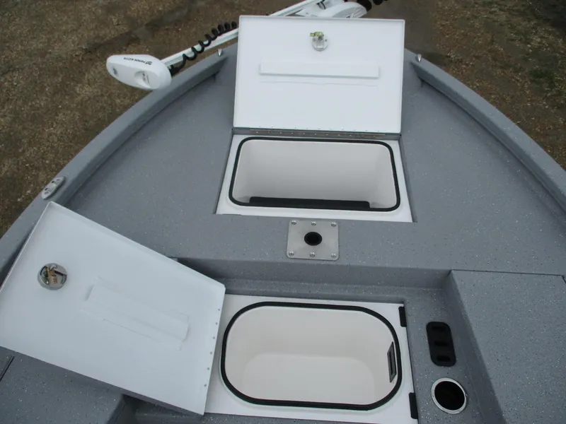 Slide: The Image of 2025 Vexus ACX2000 boat with open storage compartments on deck. - 7