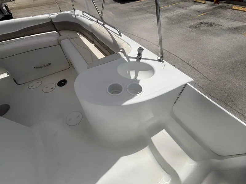 Slide: The Image of 2002 Monark Sunlounger 215 boat interior with sink and seating area. - 15