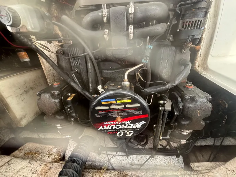 Slide: The Image of Engine of a 2002 Monark Sunlounger 215 with a 5.0 Mercury motor. - 26