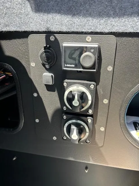 Slide: The Image of Control panel of 2024 Alukin CW750 boat with switches and dials. - 11