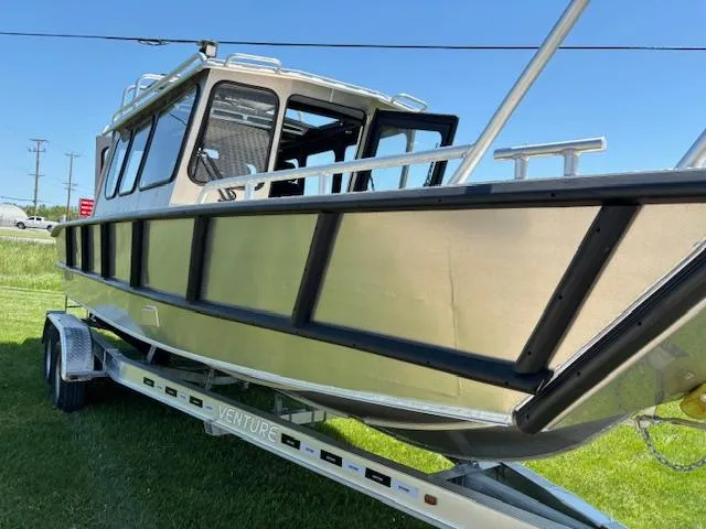 Slide: The Image of 2024 Alukin CW750 boat on trailer, side view, outdoors, sunny day. - 15