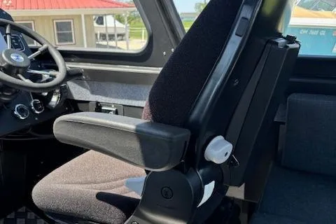 Slide: The Image of Interior of 2024 Alukin CW750 boat showing driver's seat and steering wheel. - 18