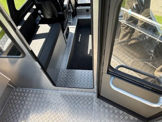 Slide: The Image of Interior view of 2024 Alukin CW750 boat, featuring sleek metal flooring and seating area. - 3