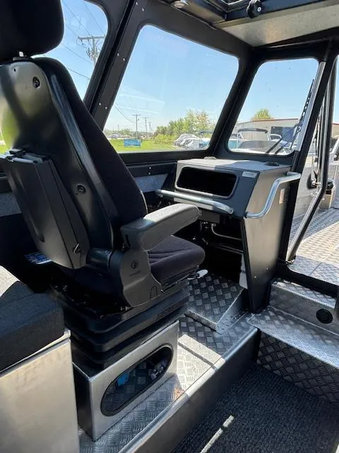 Slide: The Image of Interior of 2024 Alukin CW750 boat, featuring modern seating and control panel. - 4