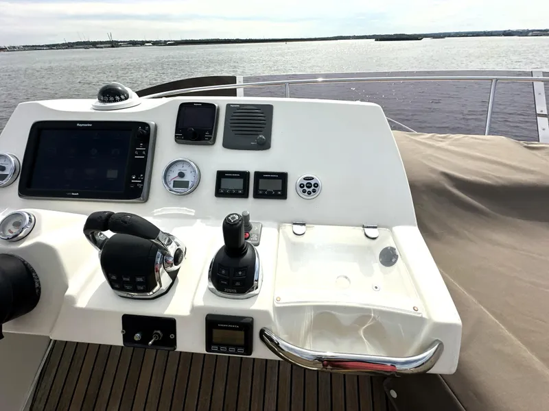 Slide: The Image of Control panel of a 2013 Prestige 500 yacht with navigational instruments. - 14