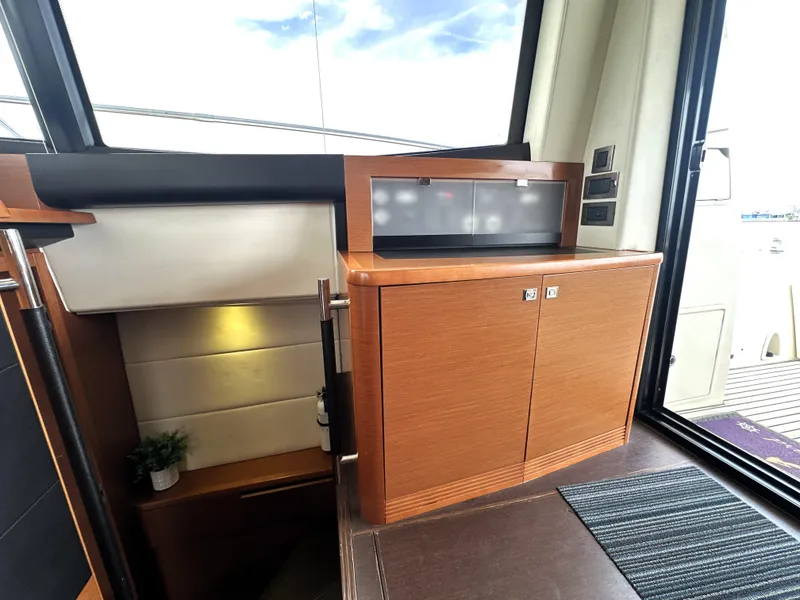 Slide: The Image of Luxurious interior of 2013 Prestige 500 yacht with wooden cabinetry and modern design. - 18