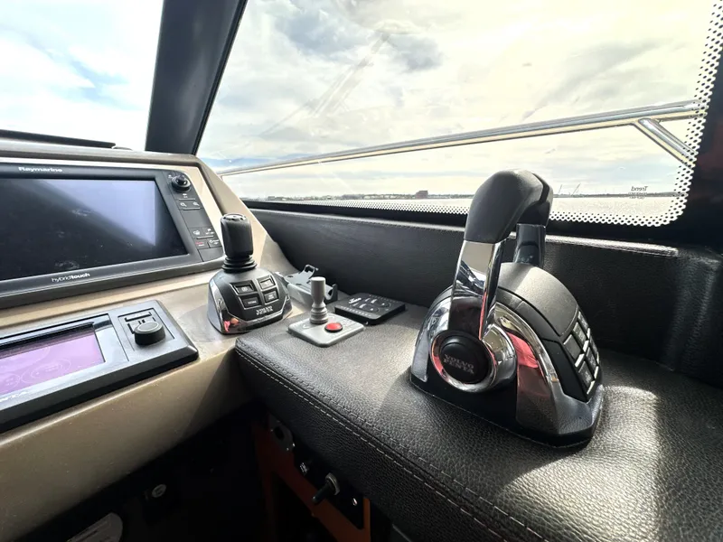 Slide: The Image of Control panel of a 2013 Prestige 500 yacht with navigation equipment. - 30